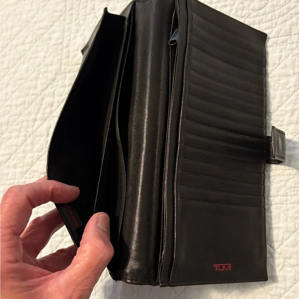 Tumi travel wallet passport card organizer.
